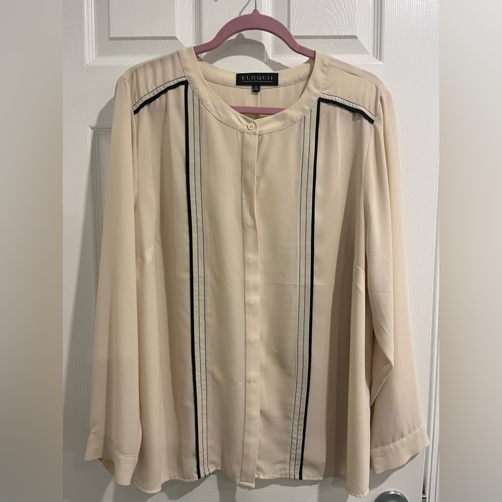 Silky cream top with black detailing
